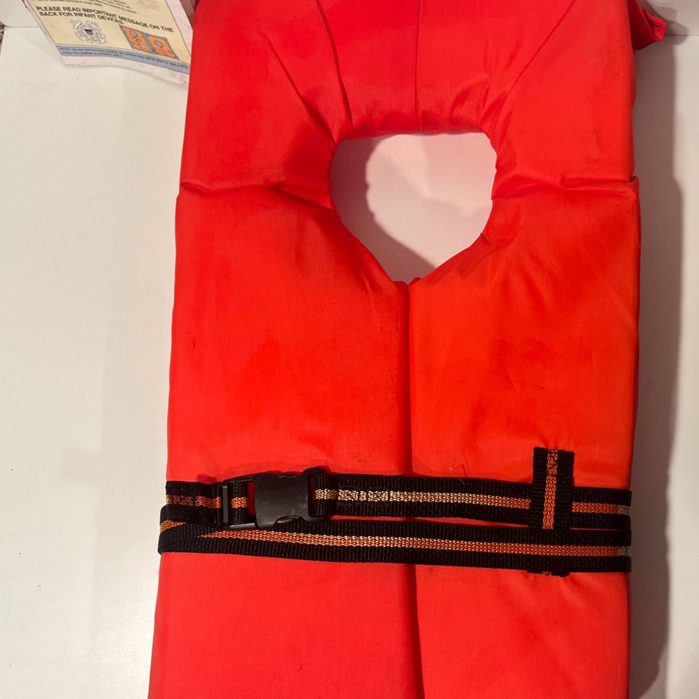 Vintage lifejacket with Think safe pamphlet